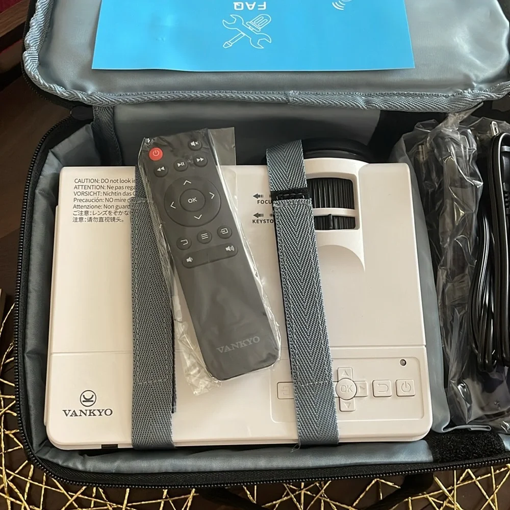 Vankyo projector with remote and case Leisure 3 never used. Brand new!